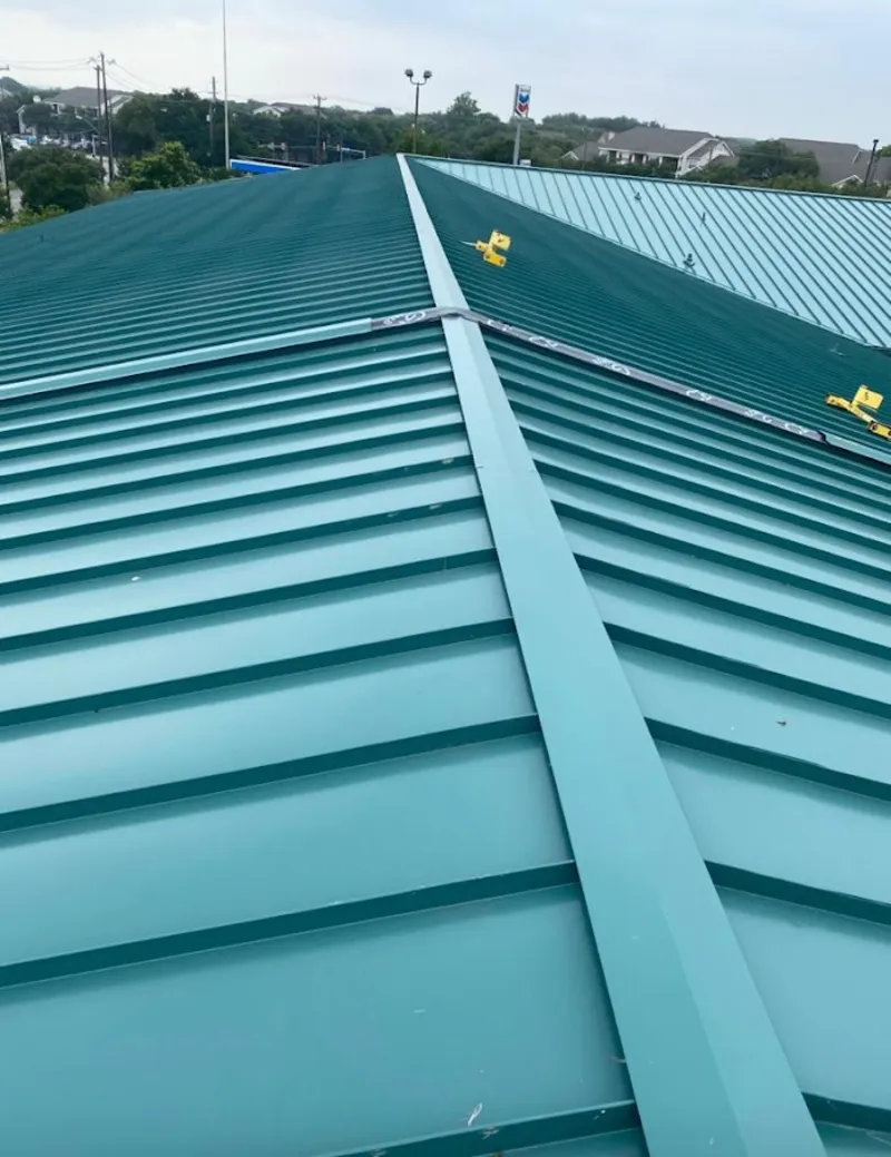 Green commercial metal roof ridge and valley for Metal Roof Repair in Dardenne Prairie
