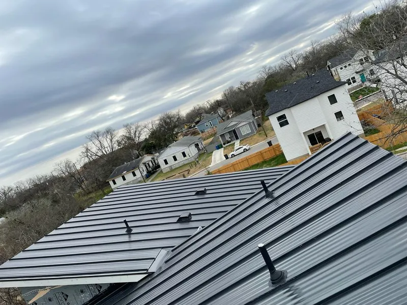 Standing seam metal roof panels with vents for Skylight Repair in Dardenne Prairie